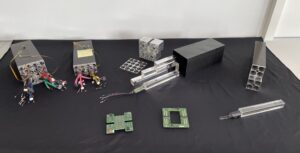 Figure 3: FWEC detector modules, their components and the electronic board for photodetector-HV-adjustment as well as the patch panel board